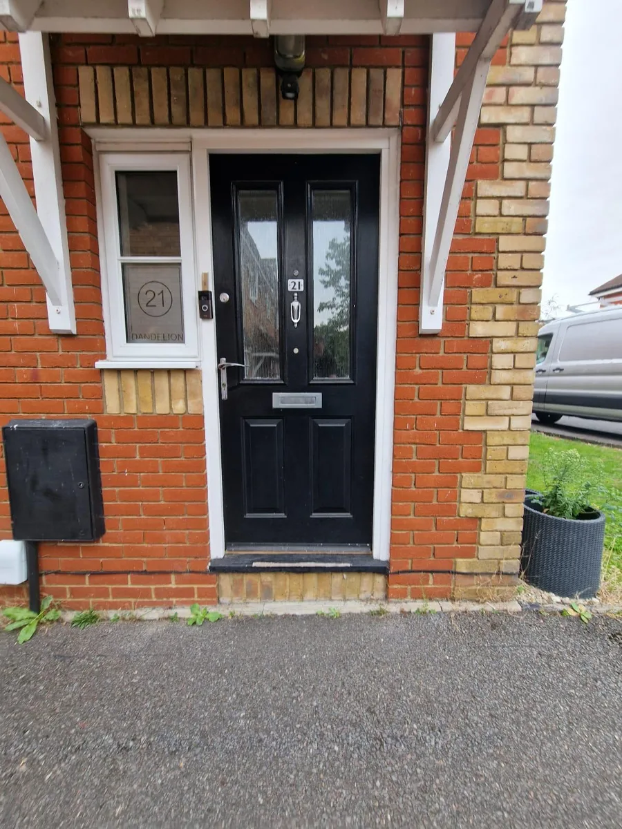 Black Composite Doors, exterior view before replacement in Chigwell by Cii Double Glazing