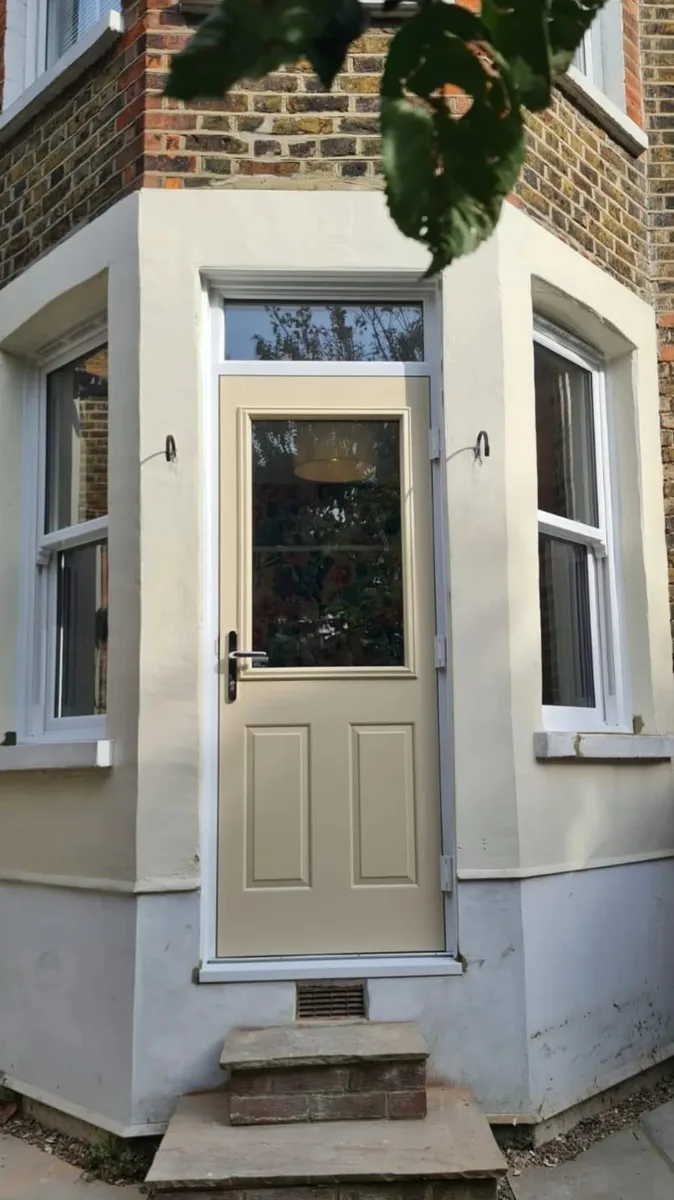 Cream Composite Doors, exterior view installed in Romford by Cii Double Glazing