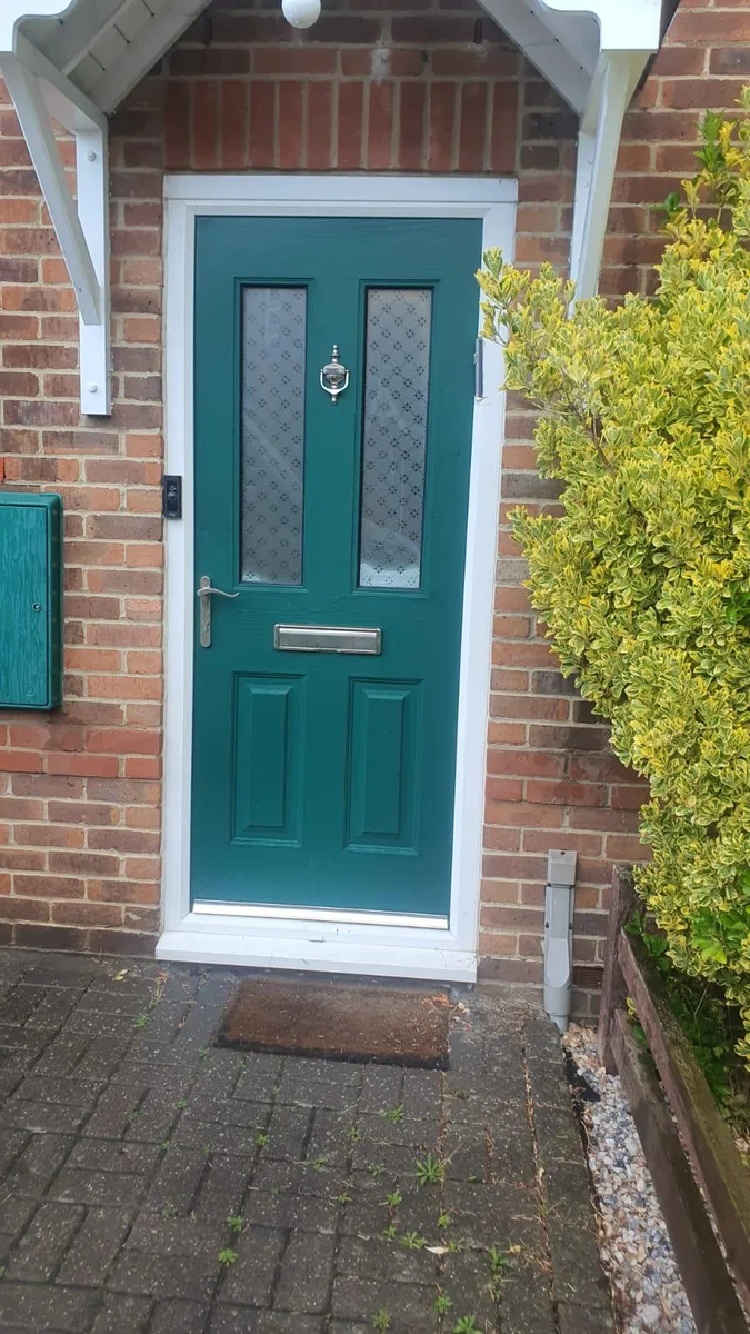 Emerald Green Composite Doors, exterior view before replacement in Chigwell by Cii Double Glazing