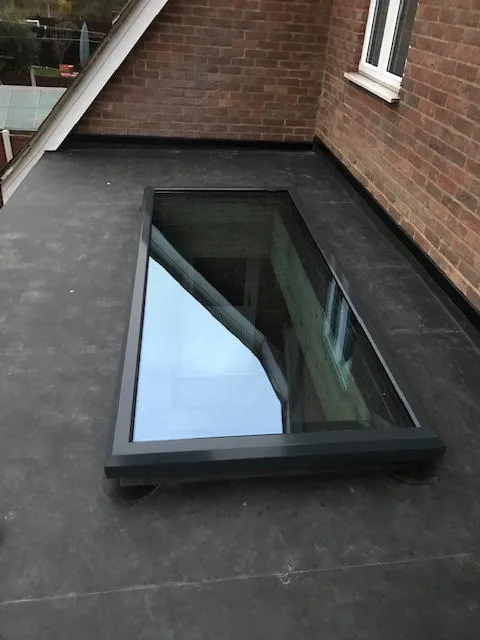 Anthracite Grey Maxi-Flat Rooflight, overhead view installed in Chigwell by Cii Double Glazing