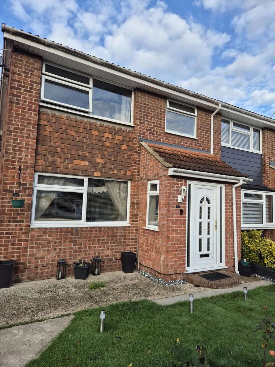 Anthracite Grey Casement Windows, front view before replacement in Romford by Cii Double Glazing